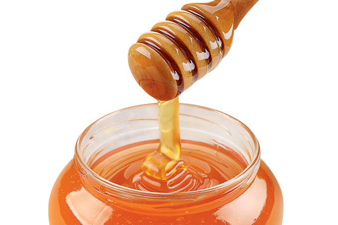 O mel natural pode substituir o açucar refinado.
